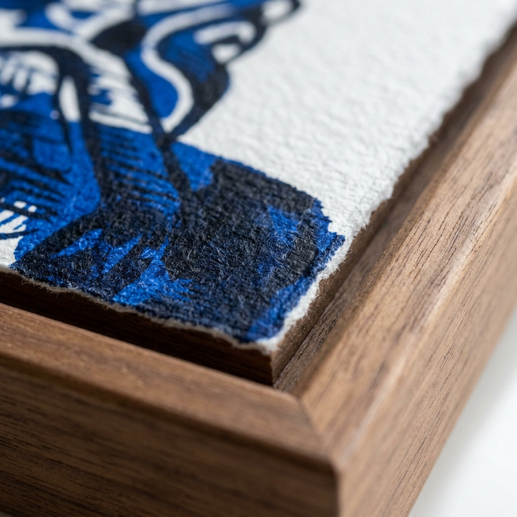 Extreme detail of the archival paper stock and flawless framing provided by New Common Stock for independent artists.